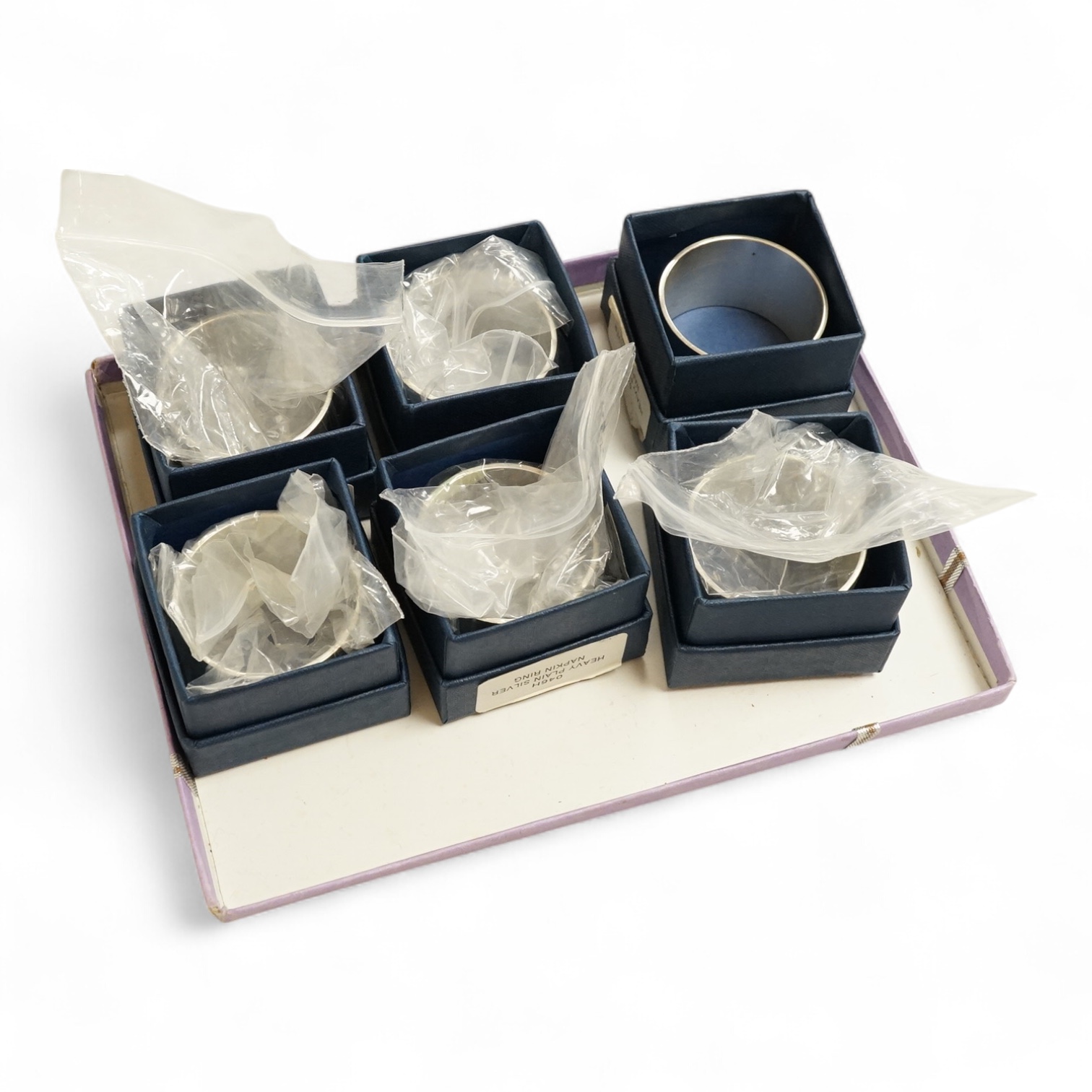 A set of six modern silver napkin rings by M C Hersey & Son Ltd, London, 1996, each individually boxed, 12.6oz.